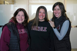 Teachers Karen Goepen-Wee, Tisha Mellor and Danna Euverman pose together for a photo.